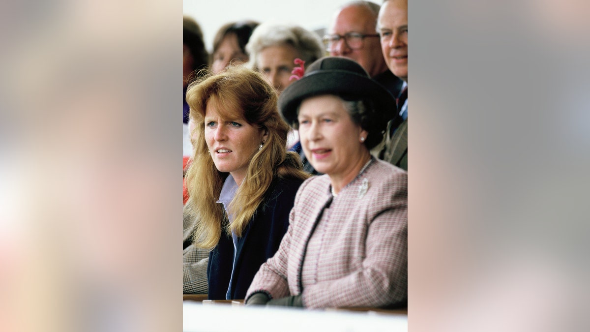 Sarah Ferguson sitting down with Queen Elizabeth II.