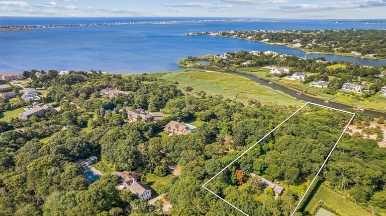 This $2.4 million Westhampton home sits on more than 2.5...