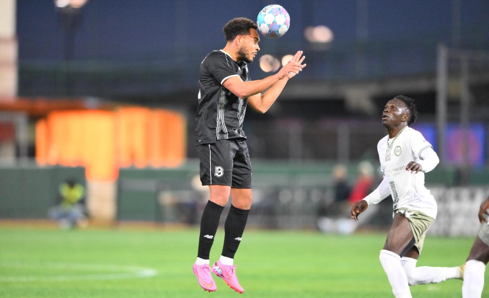 Brooklyn FC defender Thomas Vancaeyezeele jumps to head the ball during a match against Hartford Athletic at Maimonides Park.