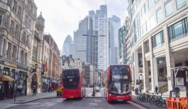 Bishopgate street view showcasing bustling city life with pedestrians, historic architecture, and modern businesses