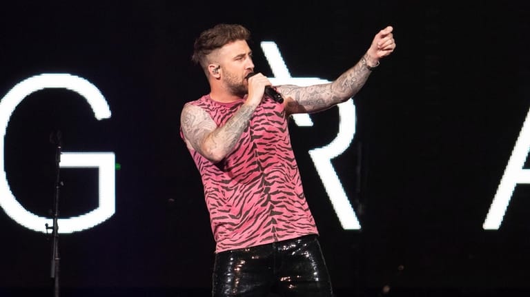 Singer Jordan McGraw performs on stage as an opening act...