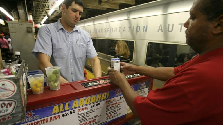 Drinks are served on a Long Island Rail Road platform...