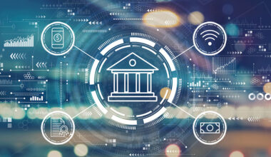 Online banking concept with blurred city abstract lights background