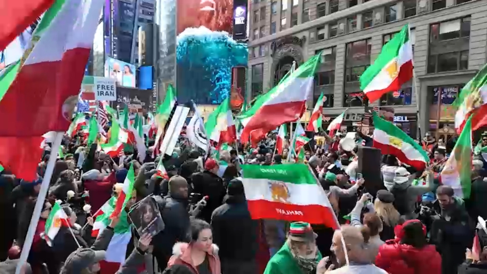 Iranians overcome with emotion, celebrate in Times Square rally
