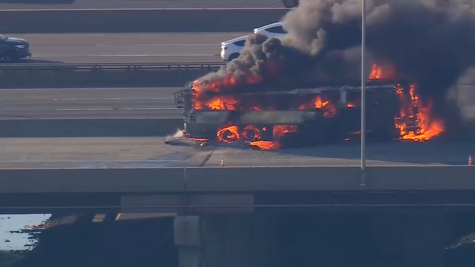 NJ Transit bus on fire on Turnpike near Newark Airport; crews working to put out flames