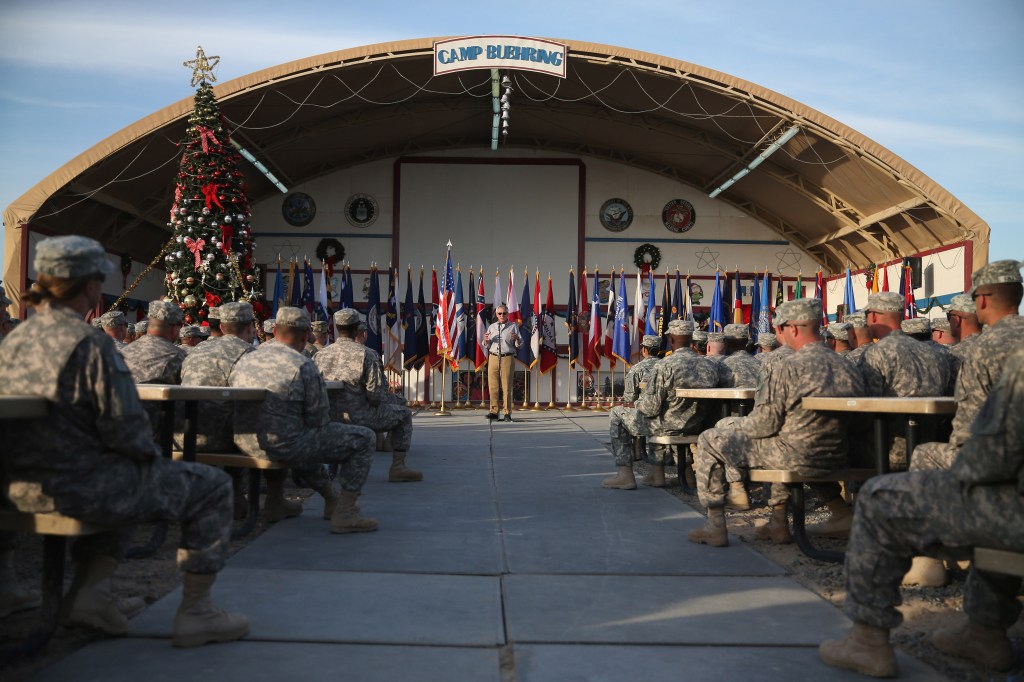 Secretary of Defense Chuck Hagel speaks to troops at Camp Buehring in Kuwait on Dec. 8, 2014.