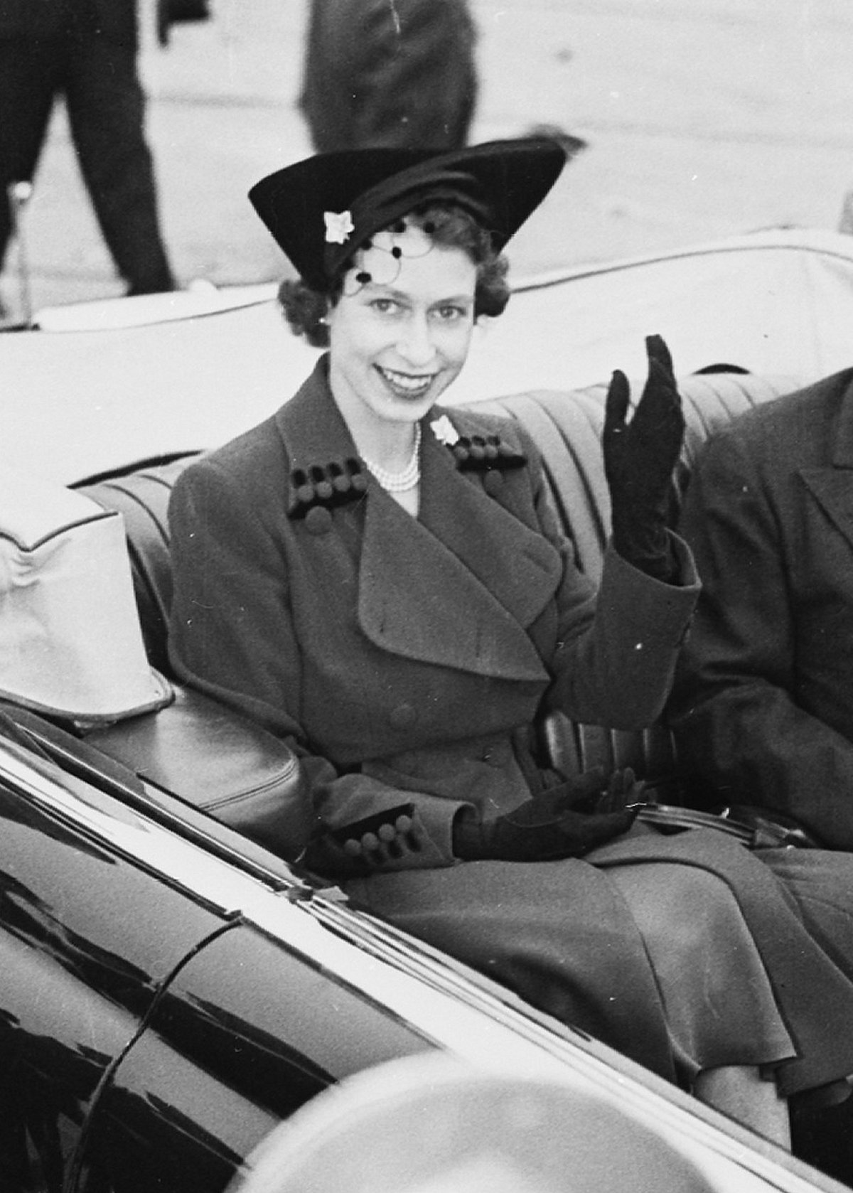 Photograph of Princess Elizabeth of Great Britain and President Truman in a limousine at Washington National Airport, 1951