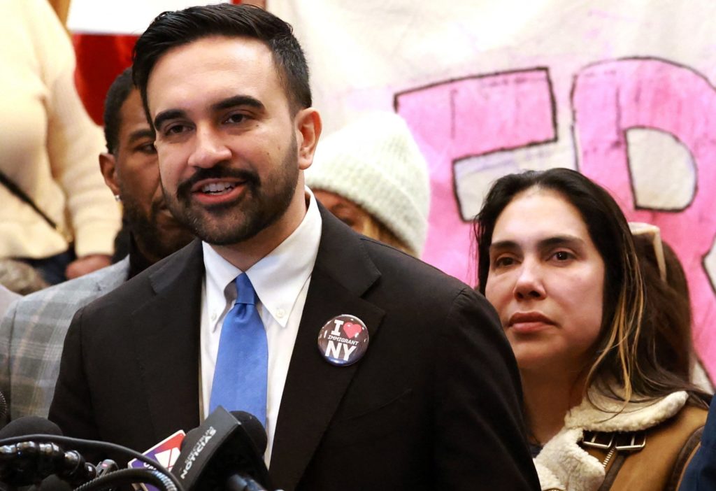 New York City high school student Dylan Contreras attends a news conference in New York