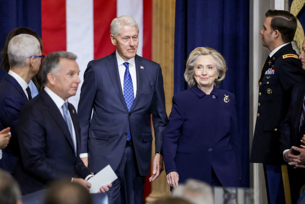 Former US President Bill Clinton (L) and former US Secretary of State Hillary Clinton (R) arrive for Donald Trump's inauguration ceremony on January 20, 2025.