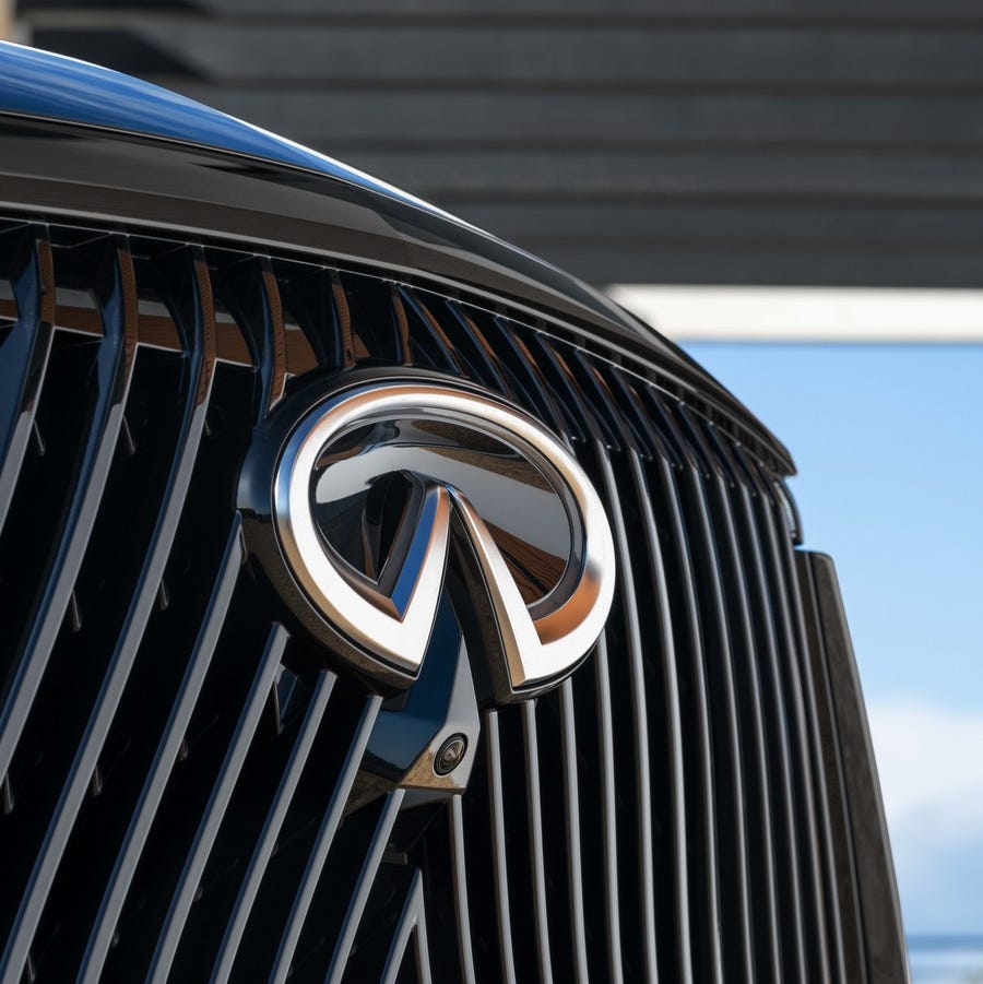person in a car interior highlighting a water bottle and an award