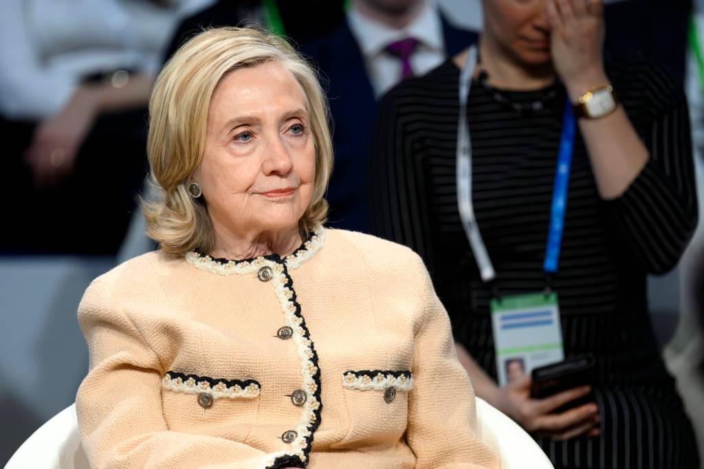 Viral video captured by paparazzi showed former President Bill Clinton appearing to nudge former first lady Hillary Clinton toward a busy New York City intersection crosswalk Tuesday.