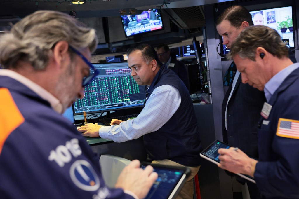 Traders working on the floor of the New York Stock Exchange.
