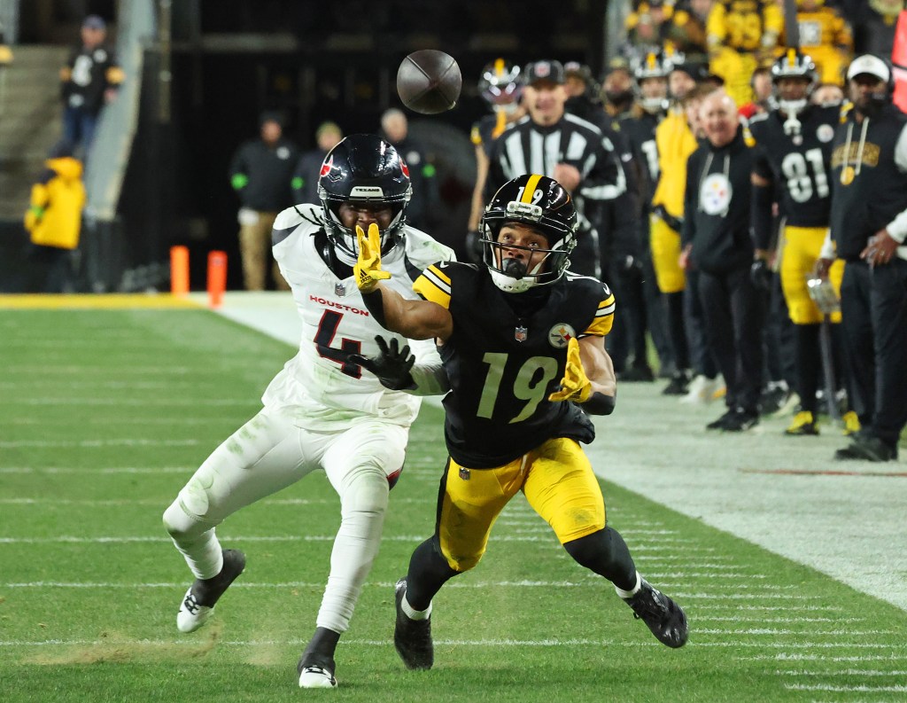 Pittsburgh Steelers wide receiver Calvin Austin III (19) fails to complete a reception under coverage by Houston Texans cornerback Kamari Lassiter (4) during the second half when the Pittsburgh Steelers played the Houston Texans in their AFC Wild Card round Monday, January 12, 2026 at Acrisure Stadium in Pittsburgh, PA.