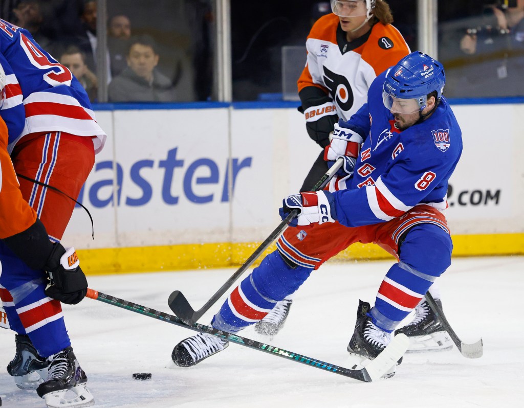 New York Rangers center J.T. Miller (8) takes a shot during the first period when the New York Rangers played the Philadelphia Flyers Thursday, February 26, 2026