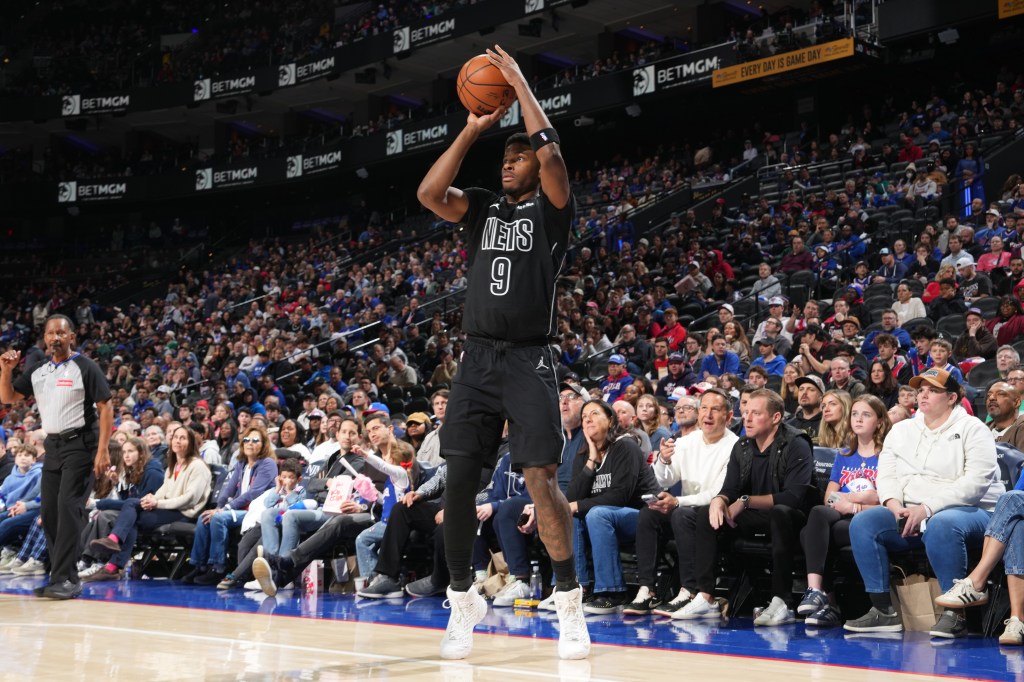  E.J. Liddell #9 of the Brooklyn Nets shoots a three point basket during the game against the Philadelphia 76ers on March 14, 2026