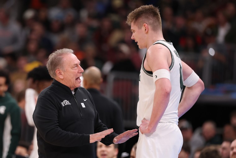 Michigan State head coach Tom Izzo talks with Jaxon Kohler during the first half against UCLA in the quarterfinals of the 2026 Big 10 Men's Basketball Tournament.
