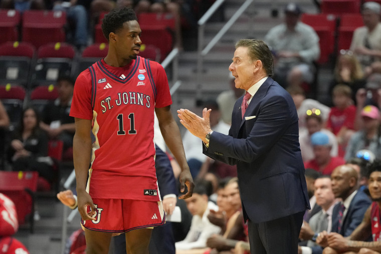 St. John's head coach Rick Pitino talks to Ian Jackson during the second round game of the 2026 NCAA Men's Basketball Tournament. 