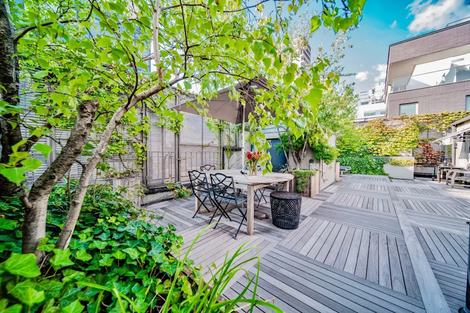 A magical terrace lies hidden in the center of Hudson Square. The Cote Team