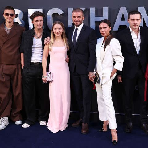 (From left to right): Romeo Beckham, Cruz Beckham, Harper Beckham, David Beckham, Victoria Beckham and Brooklyn Peltz Beckham in London in October 2023.Credit: Henry Nicholls/AFP/Getty