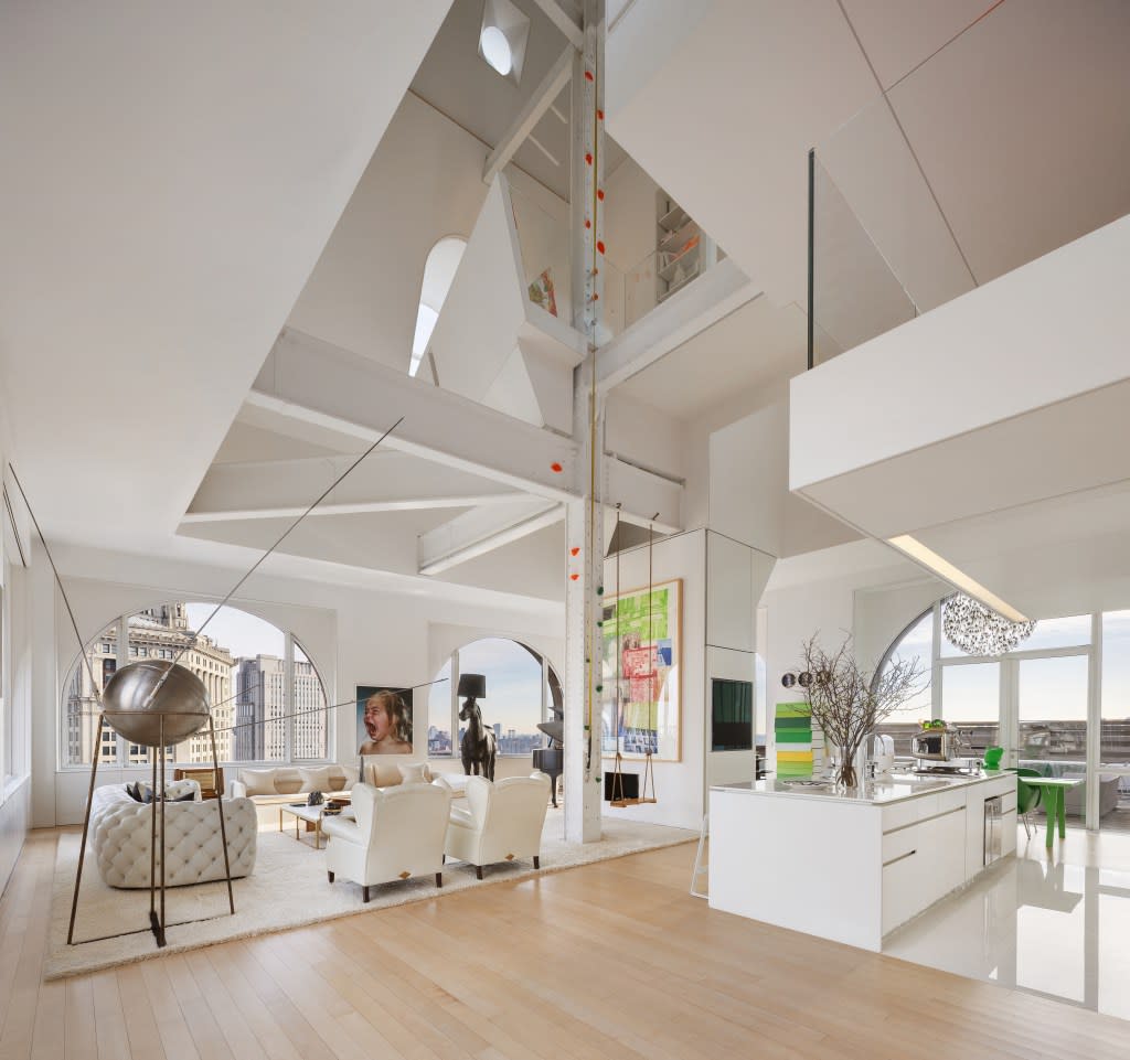 The home sits within the copper and terracotta crown of a late-19th-century building. Shannon Dupre of DD-Reps