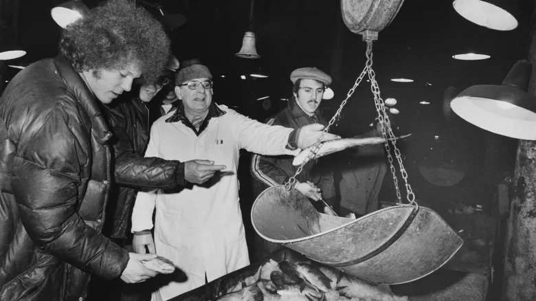 Fish being weighed in the 1970s
