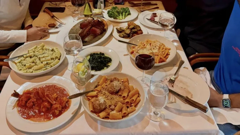 Pasta dishes are sitting on a table.
