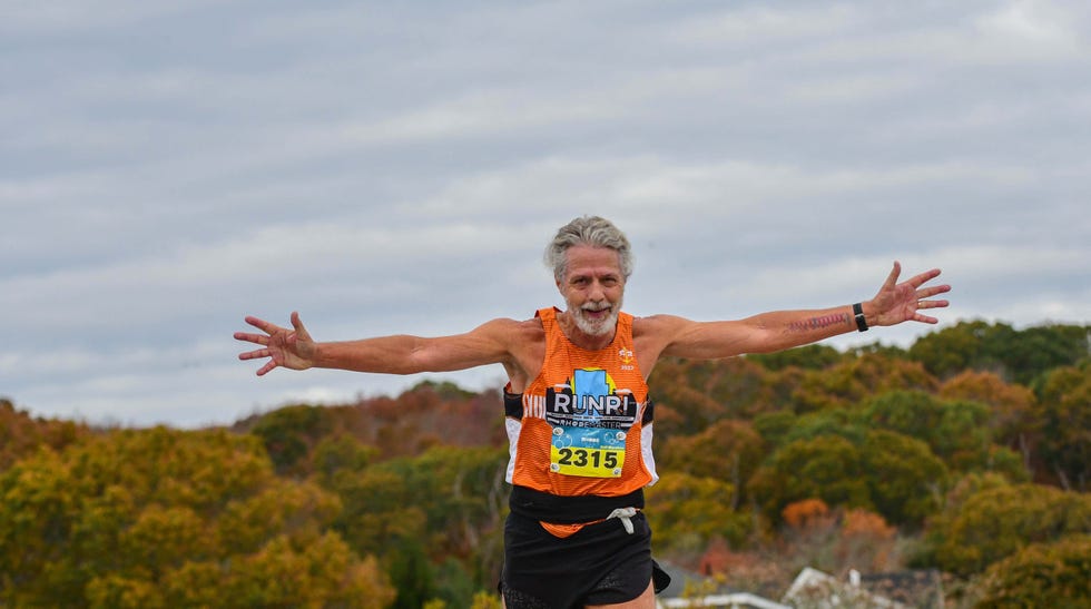 Runner celebrating in a marathon.