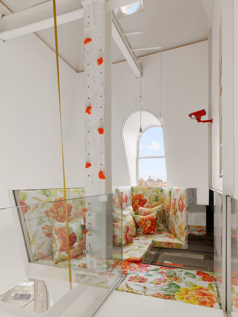 Designed by architect David Hotson with interiors by Ghislaine Viñas, the multi-level residence blends playful elements, like the slide, a rope swing, rock-climbing column and hidden ladders. Shannon Dupre of DD-Reps