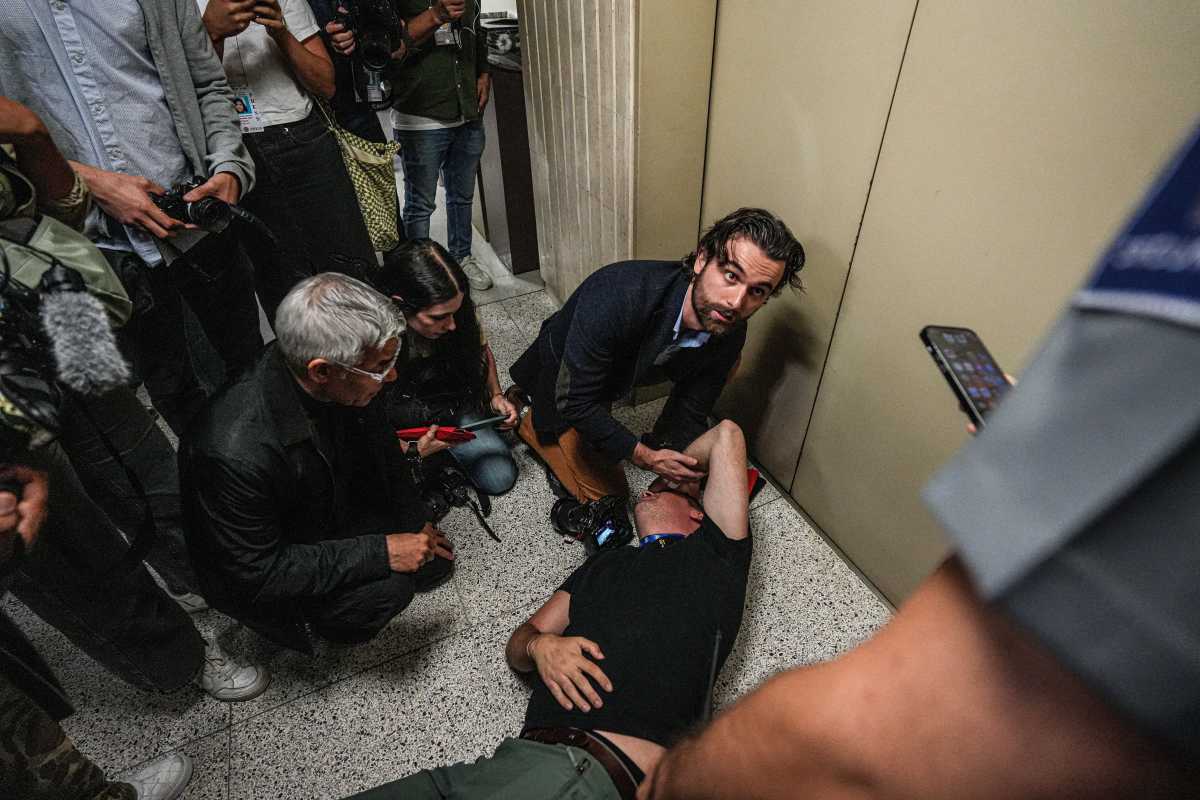 Photographer injured after ICE agent shoved him