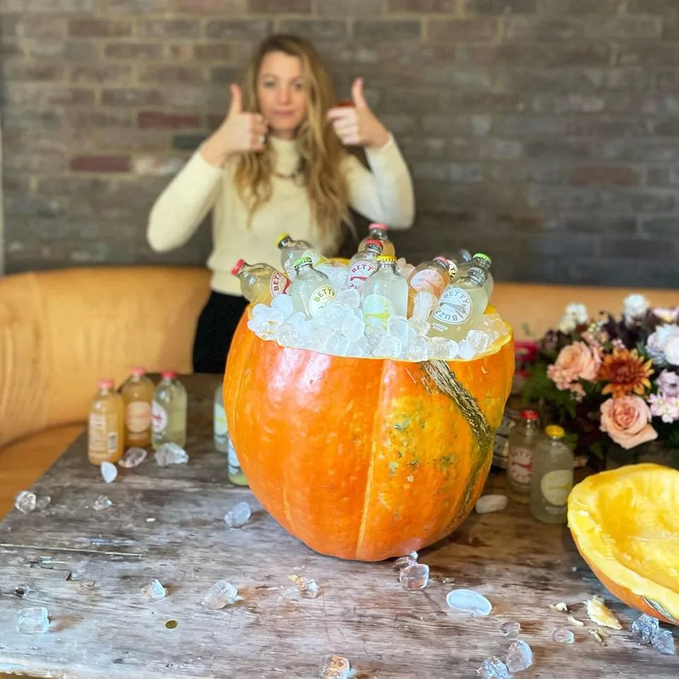 Blake Lively shows off her handmade pumpkin drink holder at home in October 2021Credit: Blake Lively/Instagram