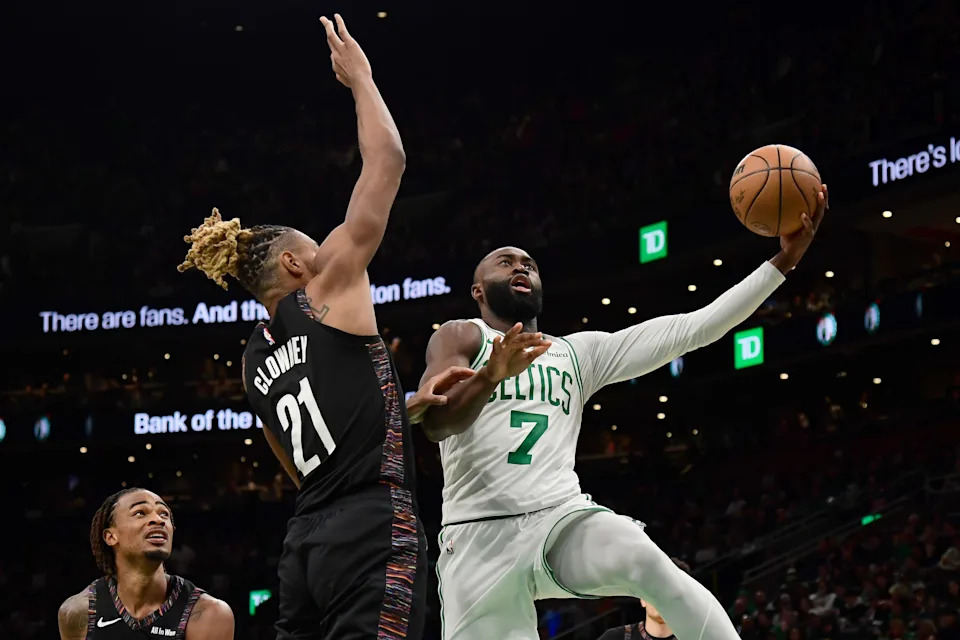 Feb 27, 2026; Boston, Massachusetts, USA; Boston Celtics guard Jaylen Brown (7) drives to the basket past Brooklyn Nets forward Noah Clowney (21) during the second half at TD Garden. Mandatory Credit: Bob DeChiara-Imagn Images
