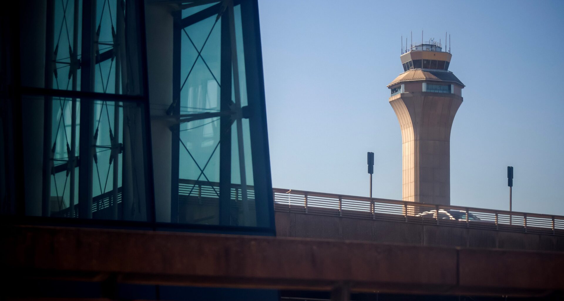 Newark Liberty International Airport halted all departures on Monday morning following a tower evacuation, effectively knocking out two of New York’s main hubs after an accident at LaGuardia Airport late Sunday also forced a suspension of services there