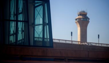 Newark Liberty International Airport halted all departures on Monday morning following a tower evacuation, effectively knocking out two of New York’s main hubs after an accident at LaGuardia Airport late Sunday also forced a suspension of services there