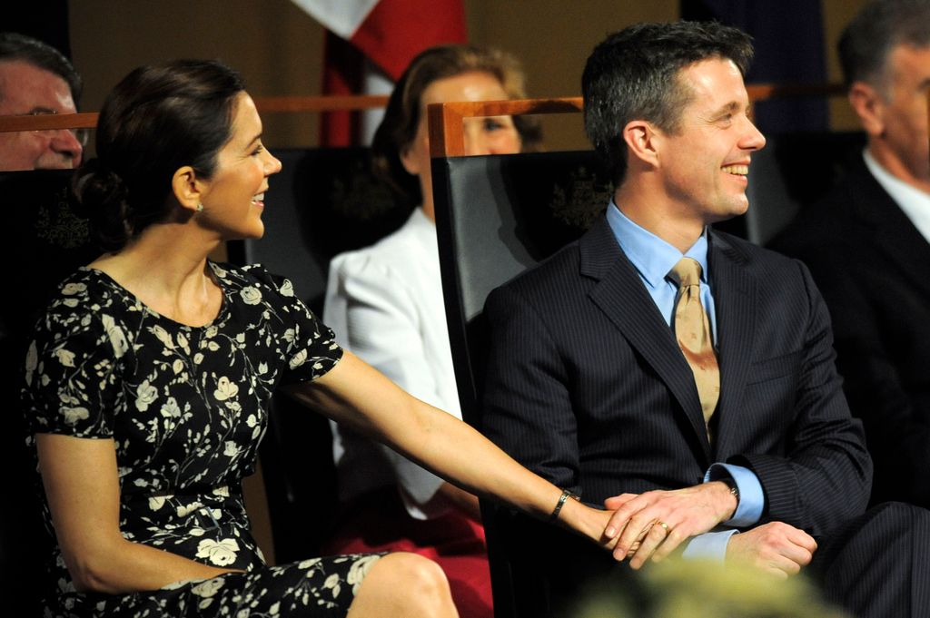 couple holding hands 