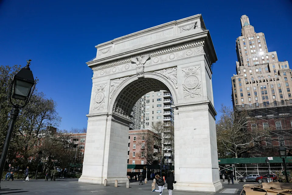 One Fifth Avenue, seen behind Washington Square Arch in New York City.