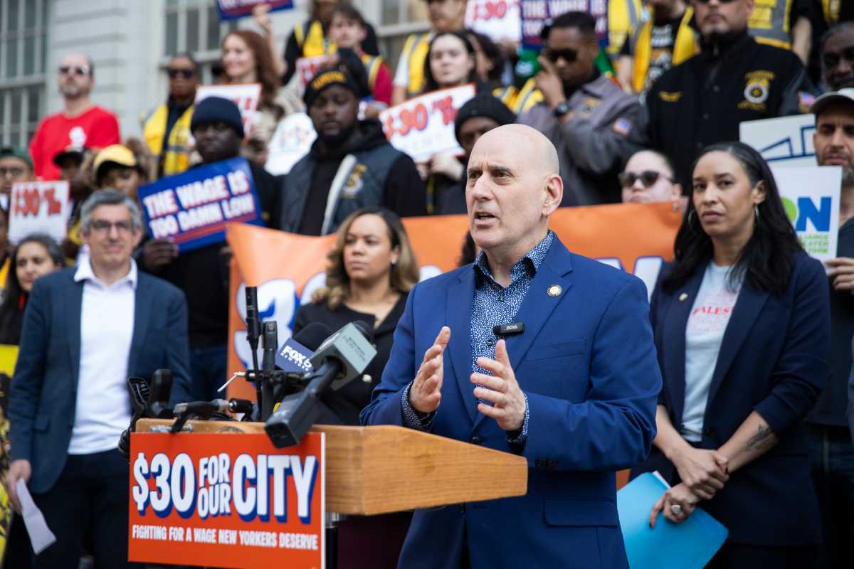man speaking about low minimum wage in new york