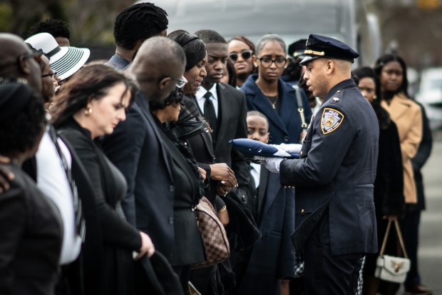 Funeral services for NYPD Police Officer and U.S. Army National Guard Major Sorffly Davius, who died March 6, 2026, while serving with the 42nd Infantry Division at Camp Buehring, Kuwait, at the Christian Cultural Center in Brooklyn on Friday, March 26, 2026. 