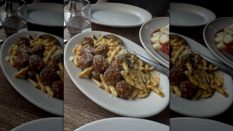brown butter cavatelli and sausage on a white plate at Frankies Spuntino Italian restaurant in New York