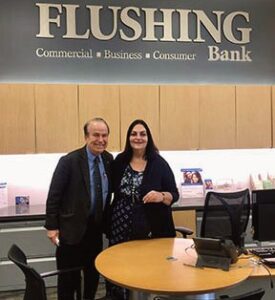 Paul Halvatzis/Amorelli Realty with Irene Demopoulos of Flushing Bank.