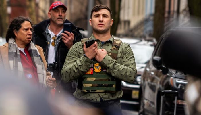 Far right activist Jake Lang stands outside Gracie Mansion, the official residence of New York Mayor Zohran Mamdani, during an anti-Islam protest which also drew counter-protesters in New York, New York, US, March 7, 2026. — Reuters