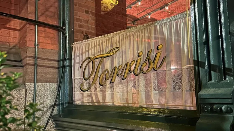 An insignia at Torrisi decorates its exterior.