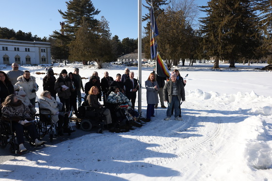 Raising Disability Pride Flag