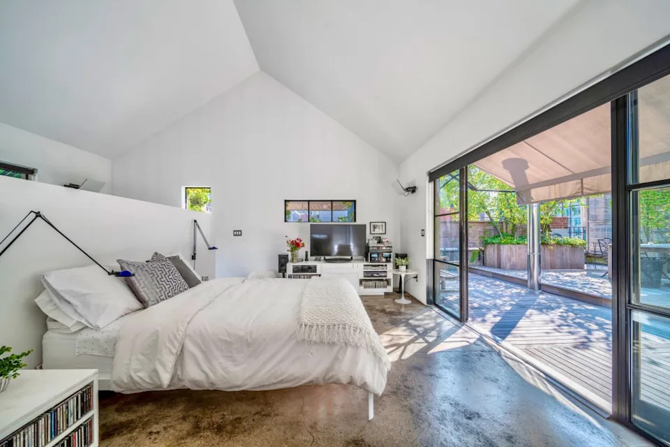 The main bedroom opens to the terrace. The Cote Team