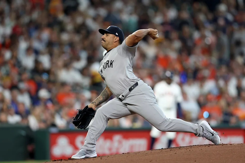 Nestor Cortes of the New York Yankees pitches in the first inning against the Houston Astros on Opening Day at Minute Maid Park.