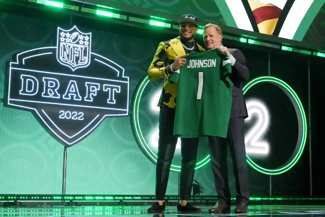 Apr 28, 2022; Las Vegas, NV, USA; Florida State defensive end Jermaine Johnson with NFL commissioner Roger Goodell after being selected as the twenty-sixth overall pick to the New York Jets during the first round of the 2022 NFL Draft at the NFL Draft Theater. Mandatory Credit: Kirby Lee-USA TODAY Sports