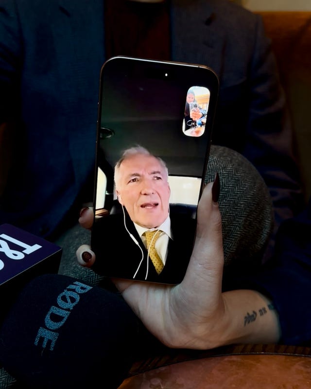 Video call being conducted on a smartphone. Video call being conducted on a smartphone.