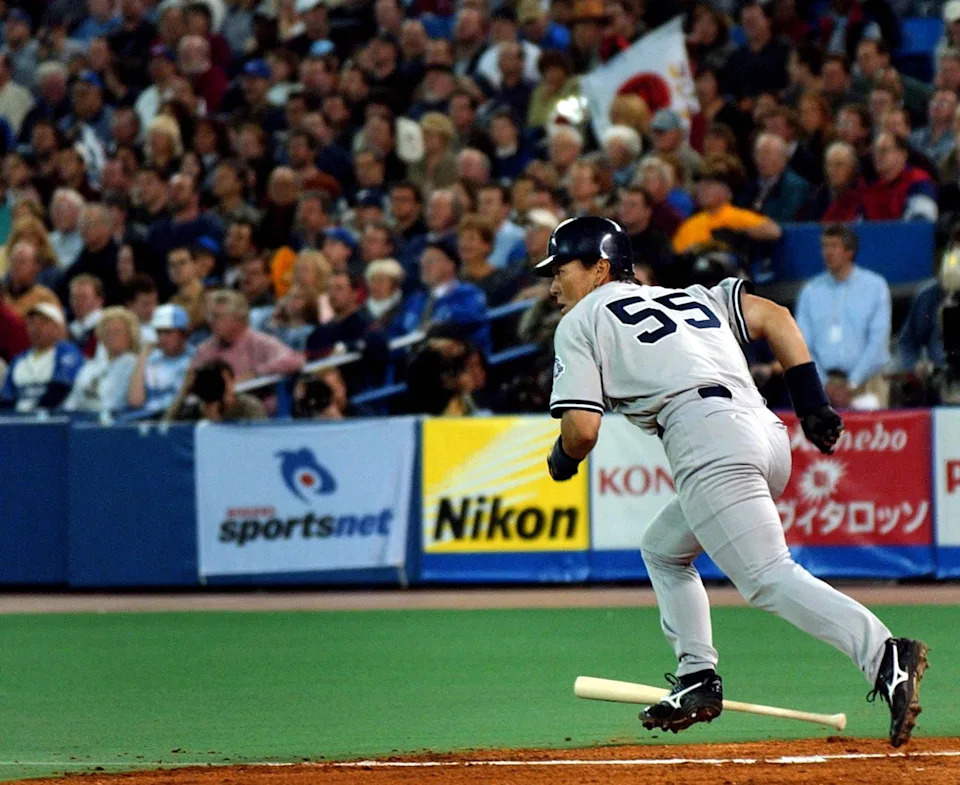 New York Yankees' outfielder Hideki Matsui runs to first base with his MLB debut hit.
