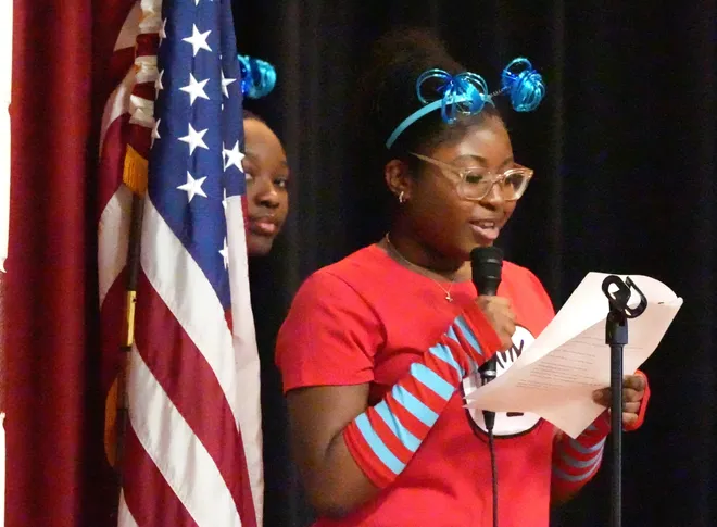Eighth-graders Krystina Nicolas and Olivia Domond as Thing 1 and Thing 2 from The Cat in the Hat during a staged reading of Dr. Seuss books at St Anthony's School in Nanuet March 5, 2026.