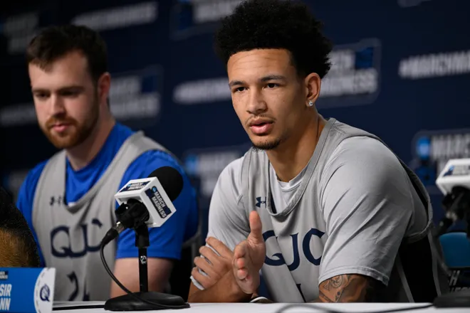 Mar 19, 2026; St. Louis, MO, USA; Queens University of Charlotte Royals guard Nasir Mann talks to the media during a practice session ahead of the first round of the men's 2026 NCAA Tournament at Enterprise Center.
