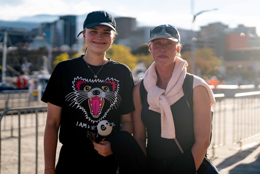 Danish tourists wait for Mary and Frederik